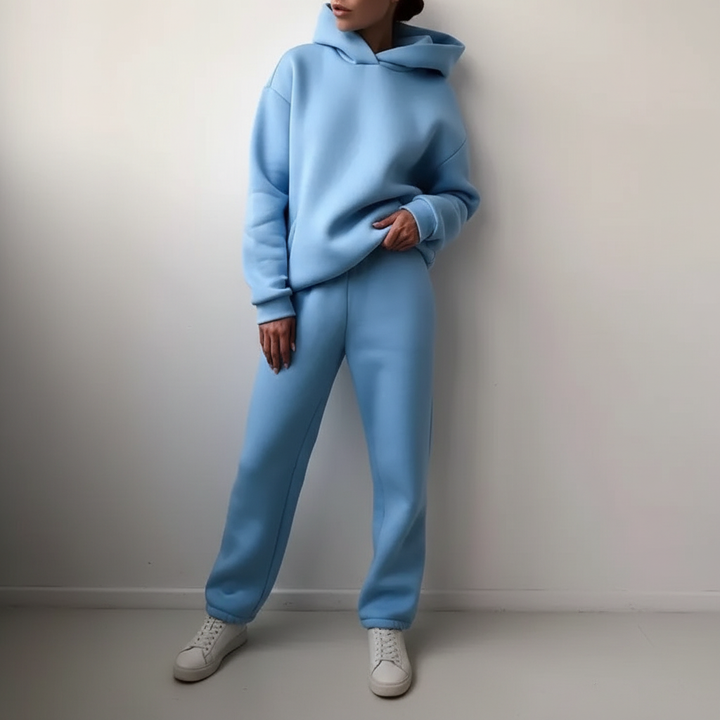 Full length shot of the stylish and cozy womens athleisure tracksuit combination