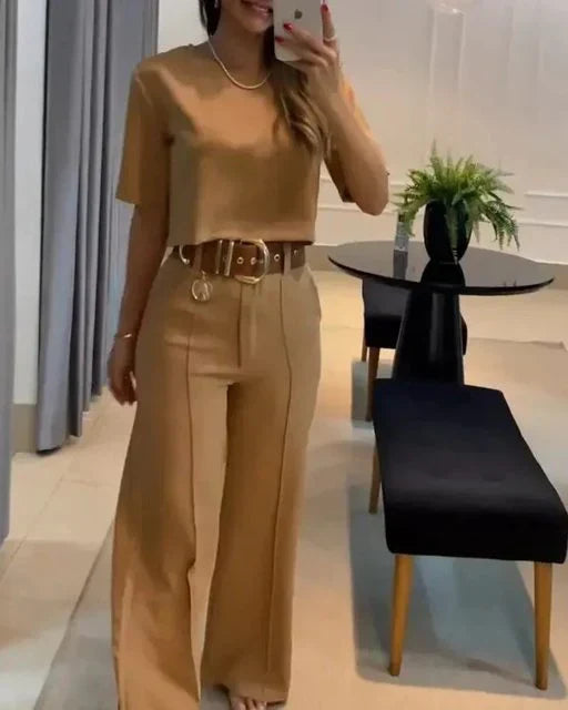 Woman wearing the elegant light khaki two-piece set with wide-leg trousers