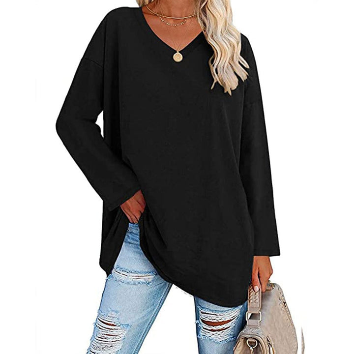 Model wearing a black loose oversize V-neck sweater