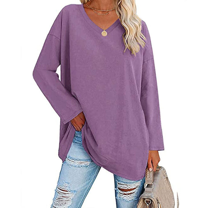 Model wearing a purple loose oversize V-neck sweater