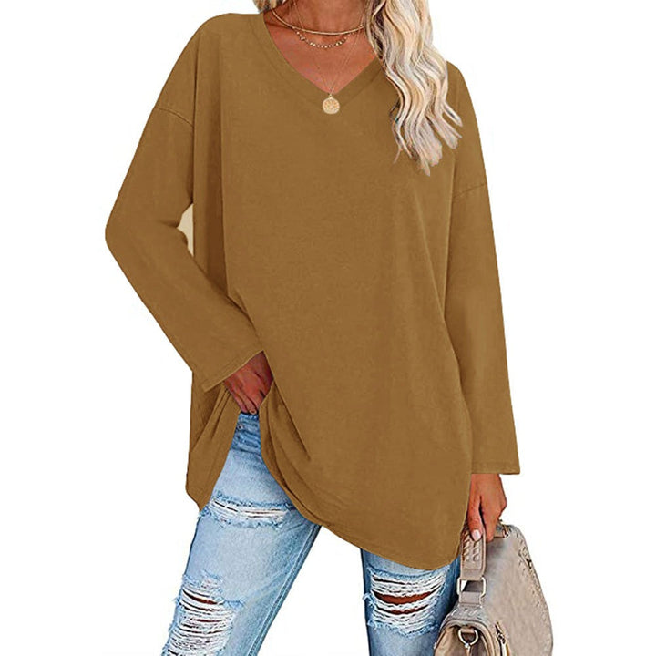Model wearing a brown loose oversize V-neck sweater