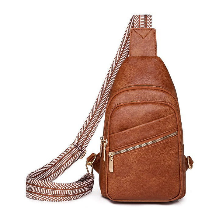 Women's modern everyday sling bag in brown with patterned strap