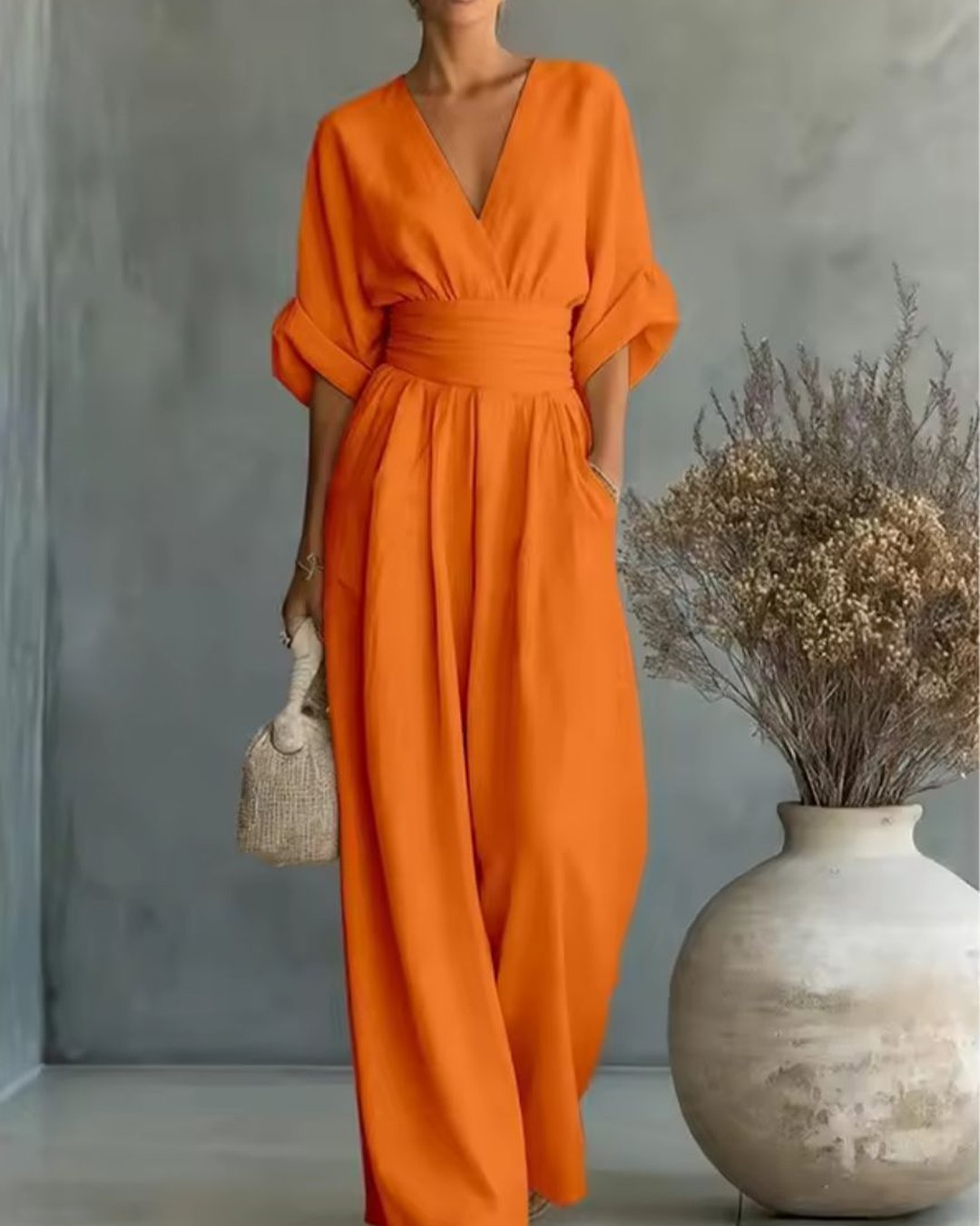 Women's elegant V-neck long sleeve jumpsuit in a chic one-piece apparel design