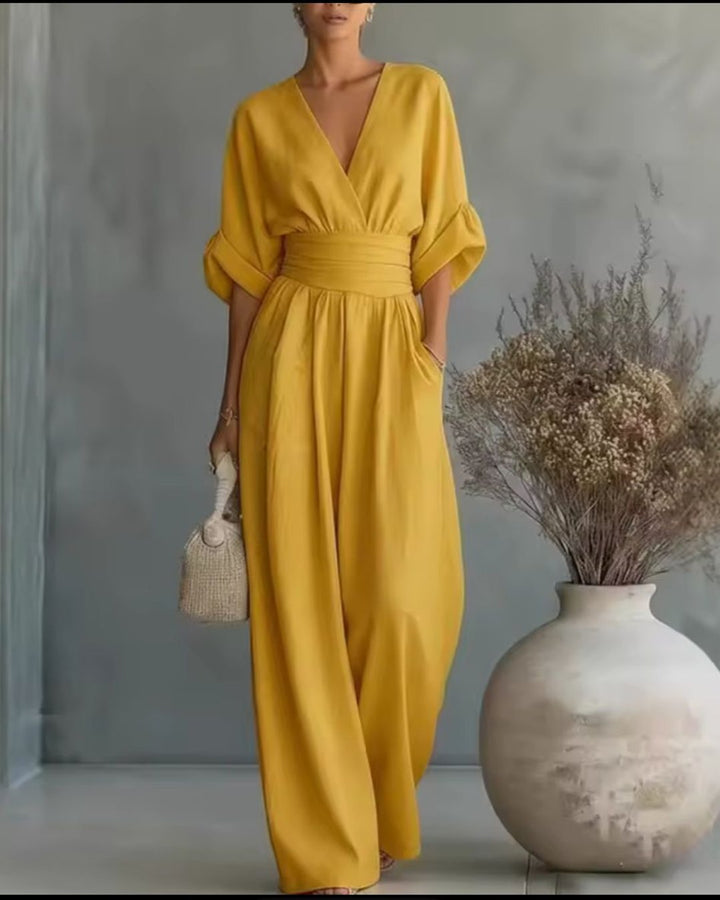 Back view showing the flattering tailored fit of this elegant women's jumpsuit