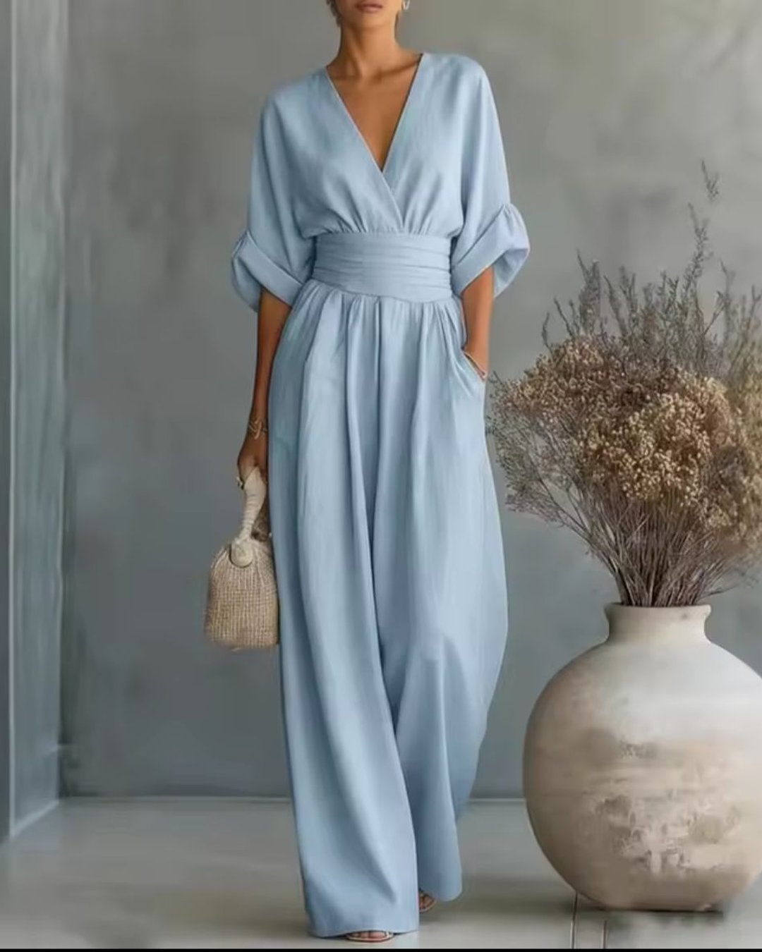 Close-up of the V-neck collar and premium fabric on the women's fashion jumpsuit
