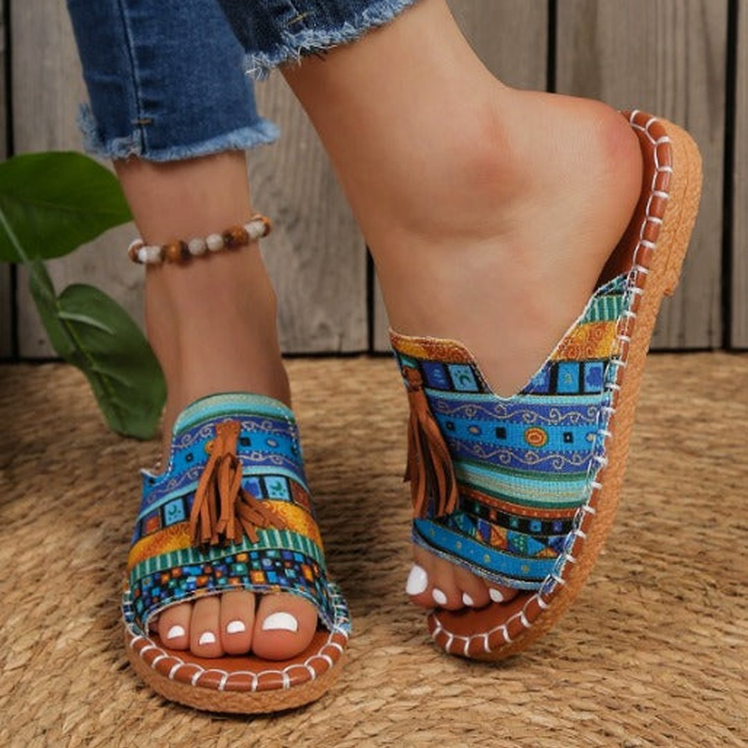Angled front view of women's comfort sandals showcasing sleek design