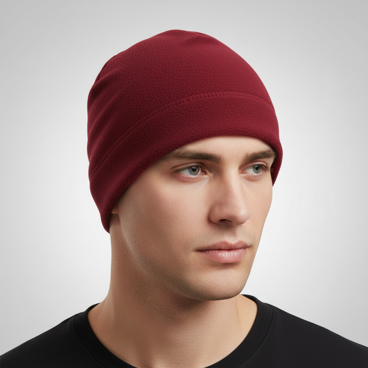 Folded winter beanie ready for packing, ideal for travel and outdoor trips