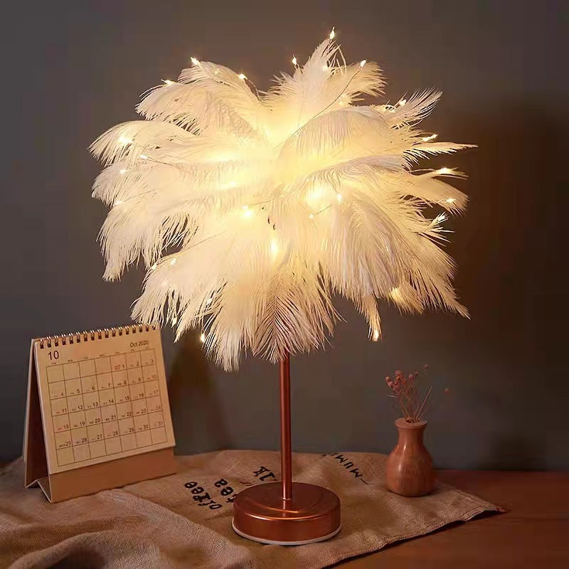 Warm ambient bedside lighting glowing through delicate feathers on a decorative lamp