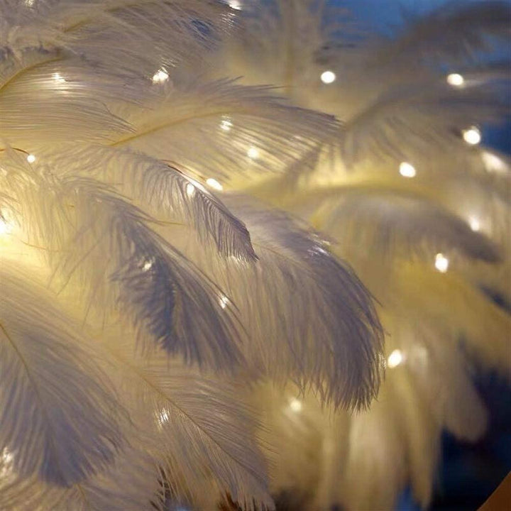 Elegant feather night light casting a cozy glow in a contemporary living space