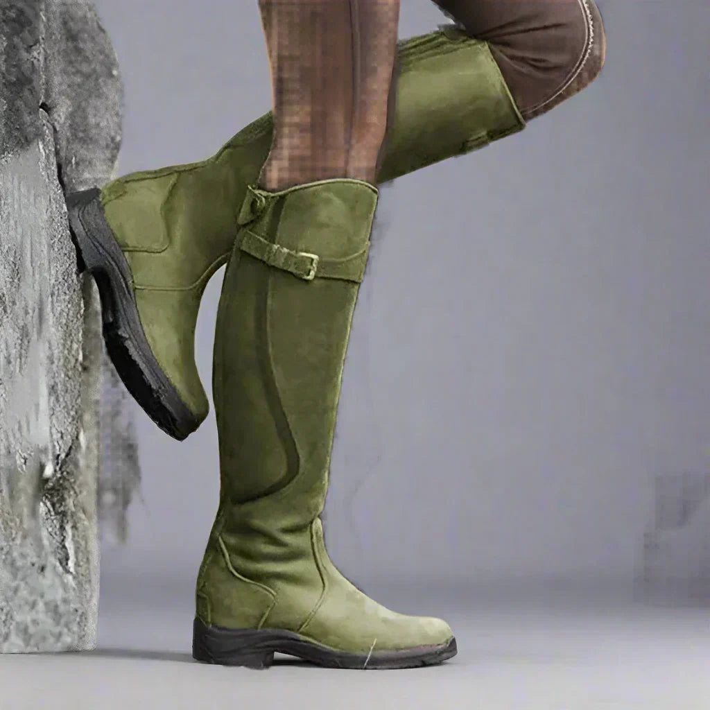 Pair of women's orthopaedic tall riding boots displayed on a flat surface