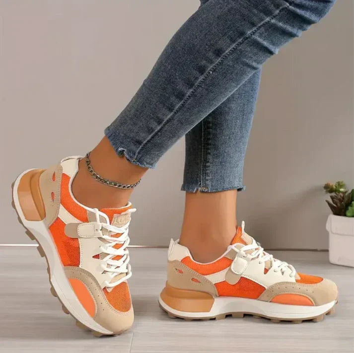 Side view of trendy women's platform sneakers showing textured non-slip sole