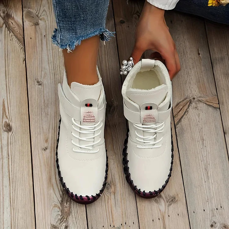 Women's warm walking boots displayed from the back heel angle