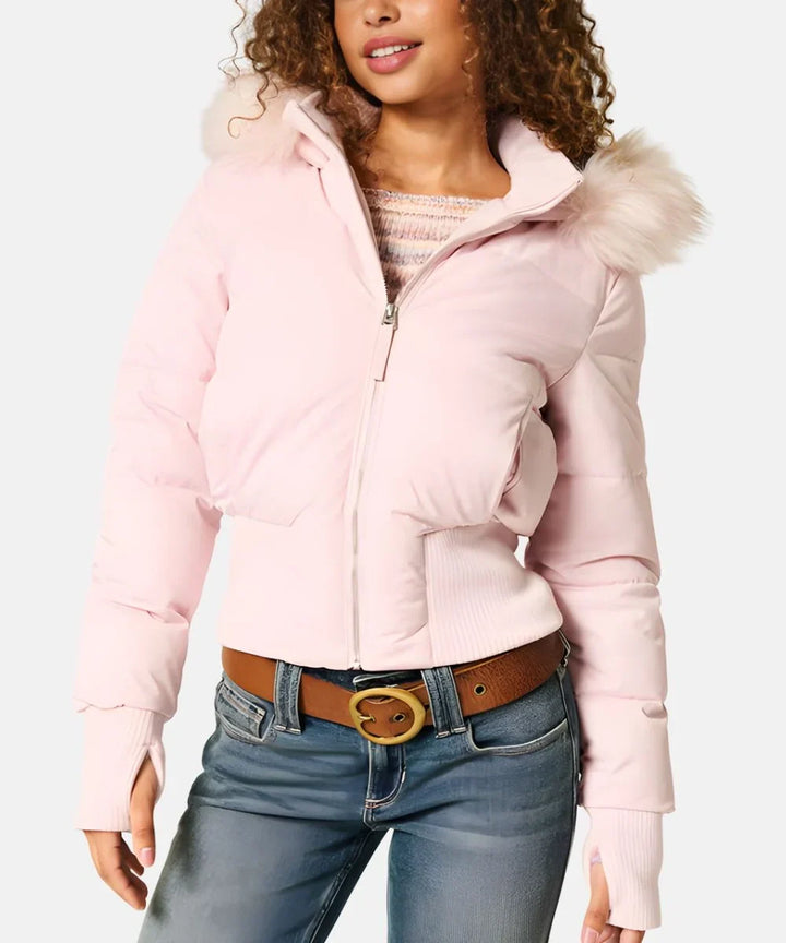 Lifestyle shot of a woman wearing the stylish winter puffer jacket outdoors