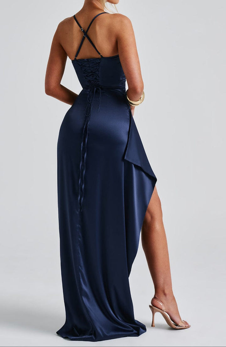 Back view showing the lace-up detail of the navy blue maxi dress
