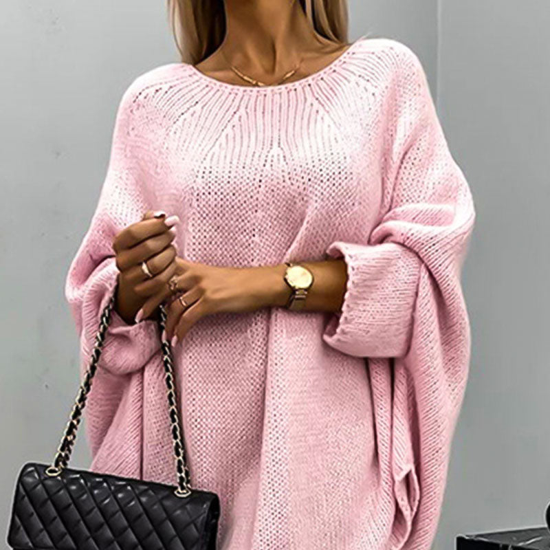 Close-up of cozy knit texture on women's oversized winter sweater top