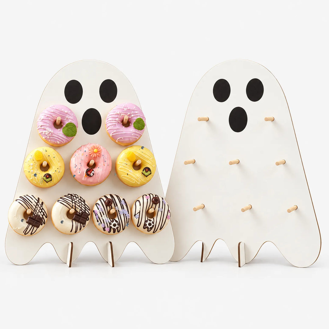 Two ghost doughnut stands displayed side by side, showing pegs and base pieces.