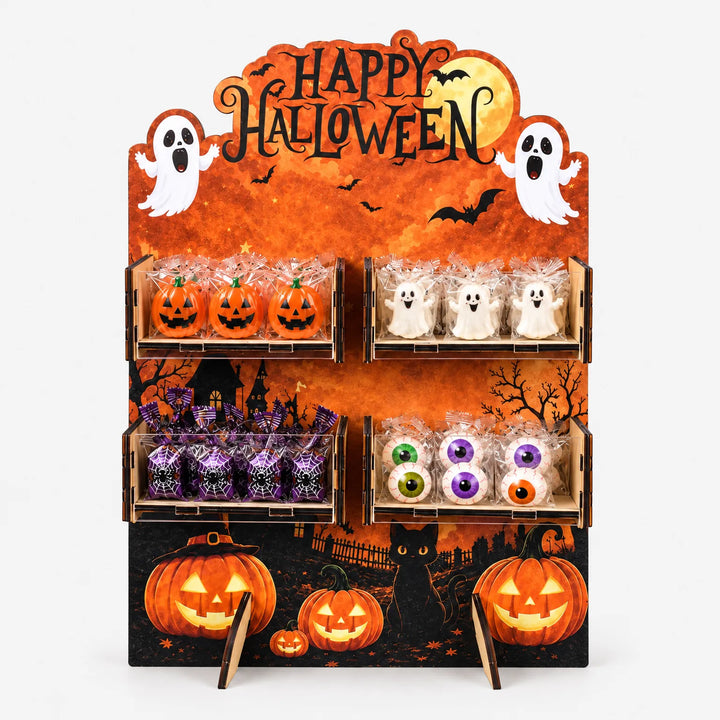 Orange wooden Happy Halloween treat stand filled with spooky snacks