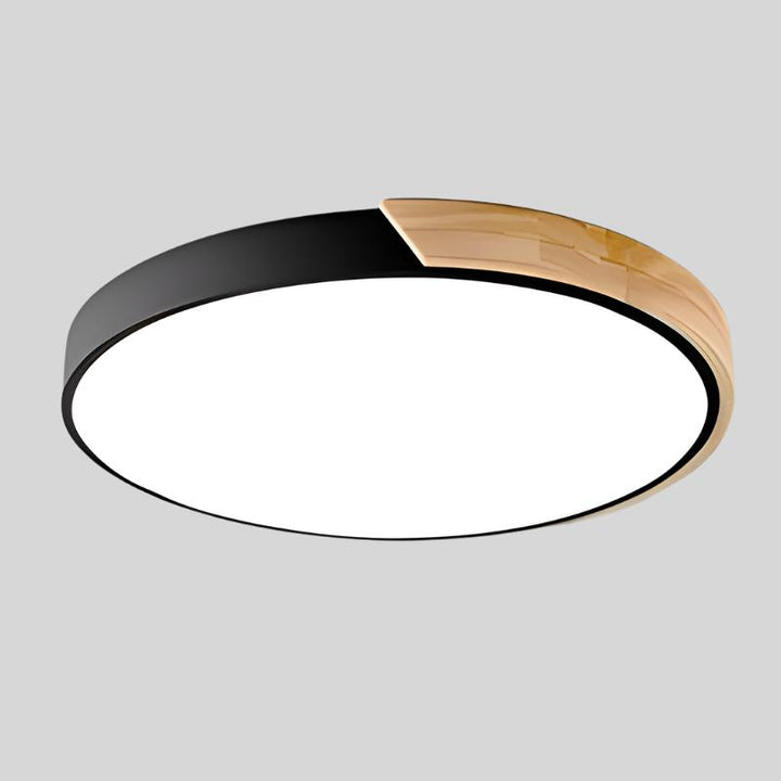 Warm ambient glow from the modern LED wooden ceiling fixture at night