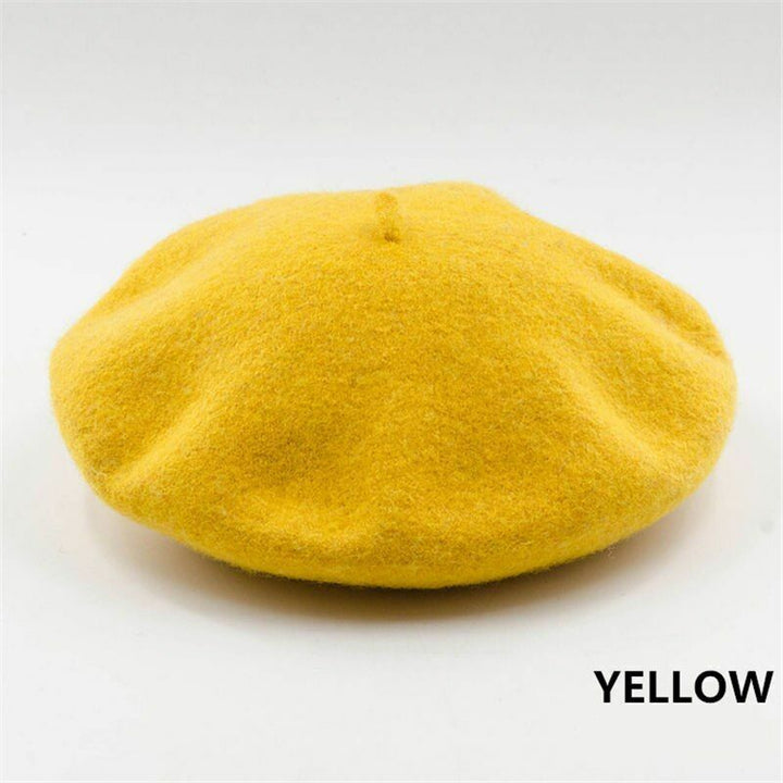 Yellow classic women's winter beret shown from a top angle