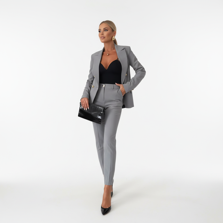 Back view of the womens suit displaying the tailored blazer silhouette