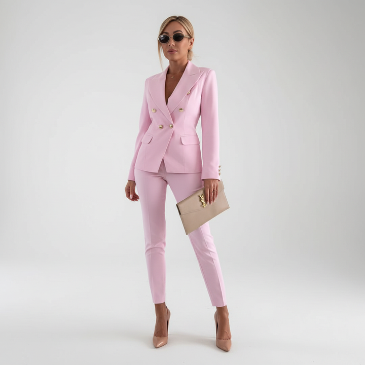 Office wear two piece set viewed from the side highlighting the slim fit trousers