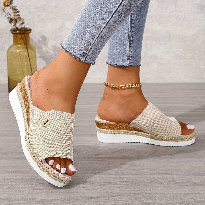Elegant wedge slides paired with casual summer apparel