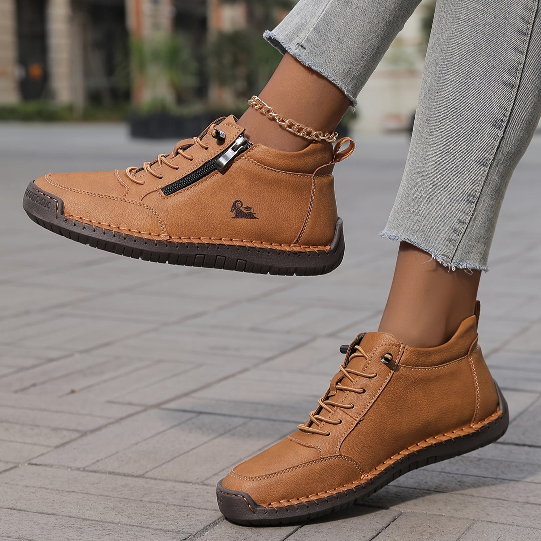 Orthopaedic women's trainers featuring a wide toe box and cushioned sole