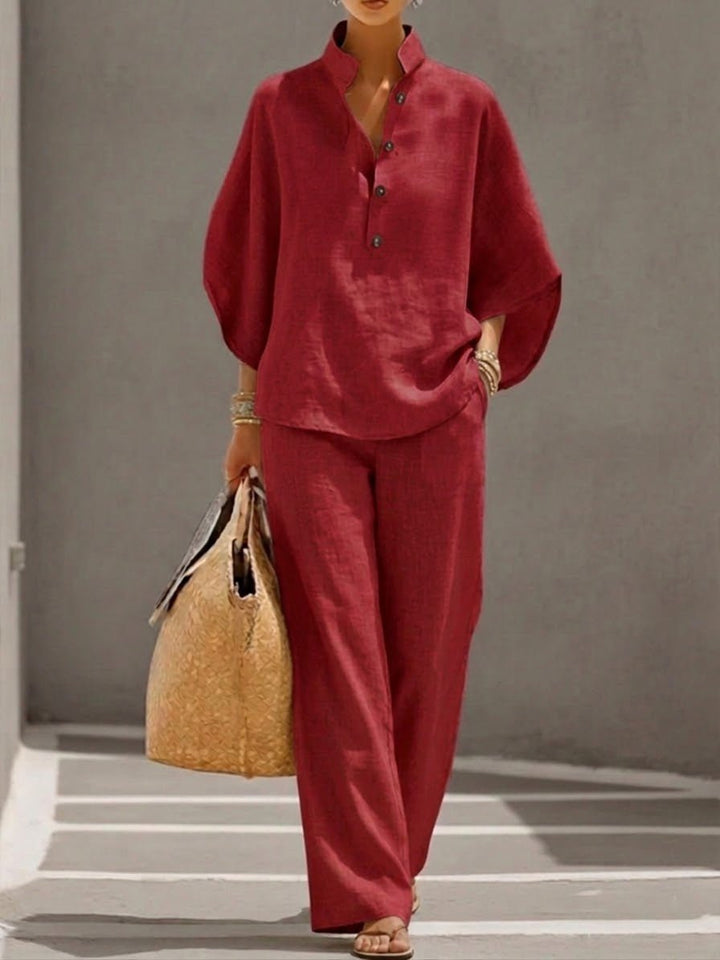 Model wearing comfortable women's batwing sleeve top and trousers set