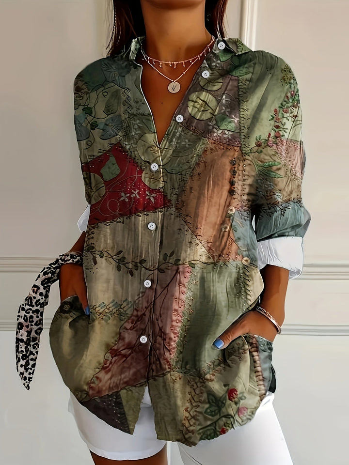 Woman wearing a vintage graphic print button-up top with V-neckline