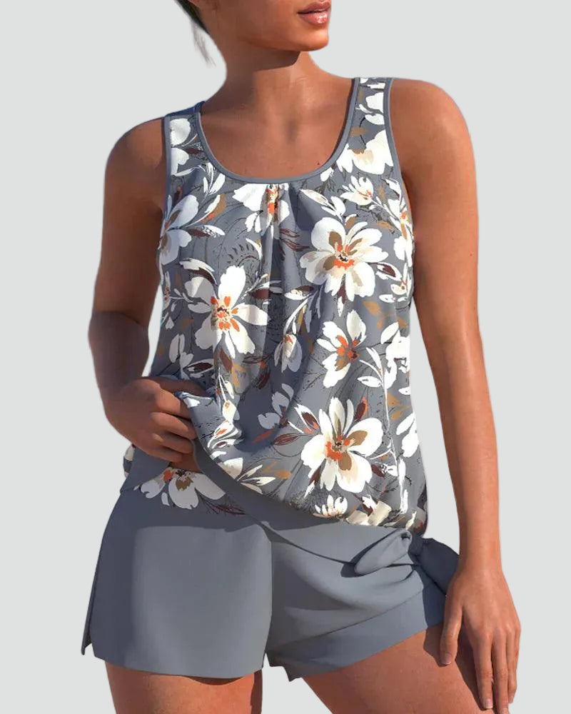 Close-up front view highlighting the floral pattern and waistline of the tankini set