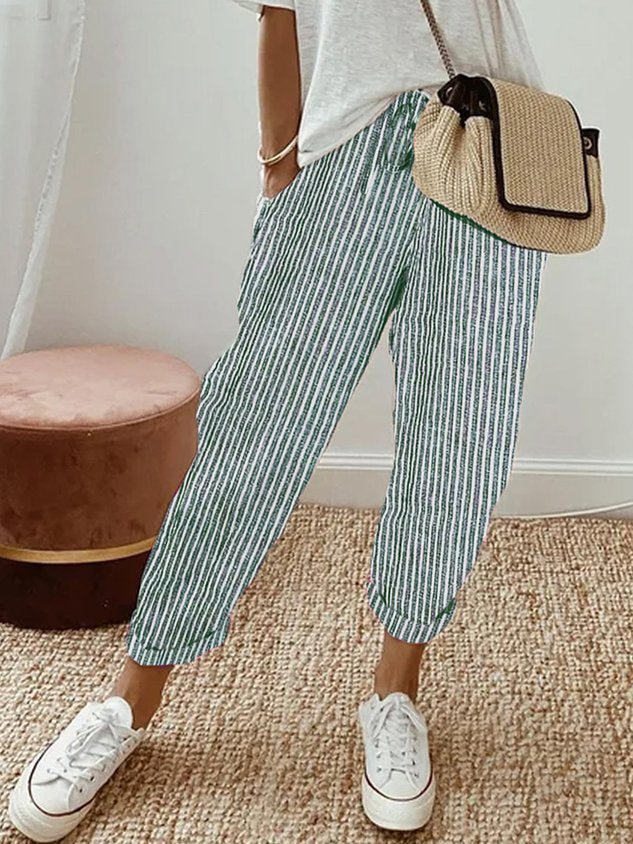 Close-up view of fabric on comfortable high-waist trousers