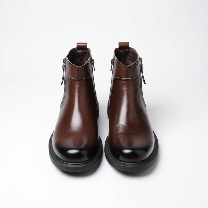 Top-down view of men's side-zip boots showing the sleek toe shape and lace-free look.