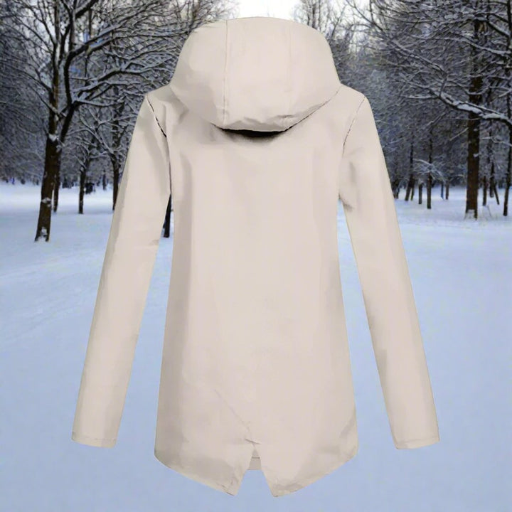Apricot waterproof hooded rain jacket back view showing curved hem