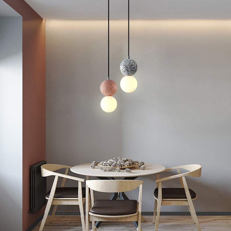 Sleek kitchen lighting solution utilizing a stylish hanging pendant lamp