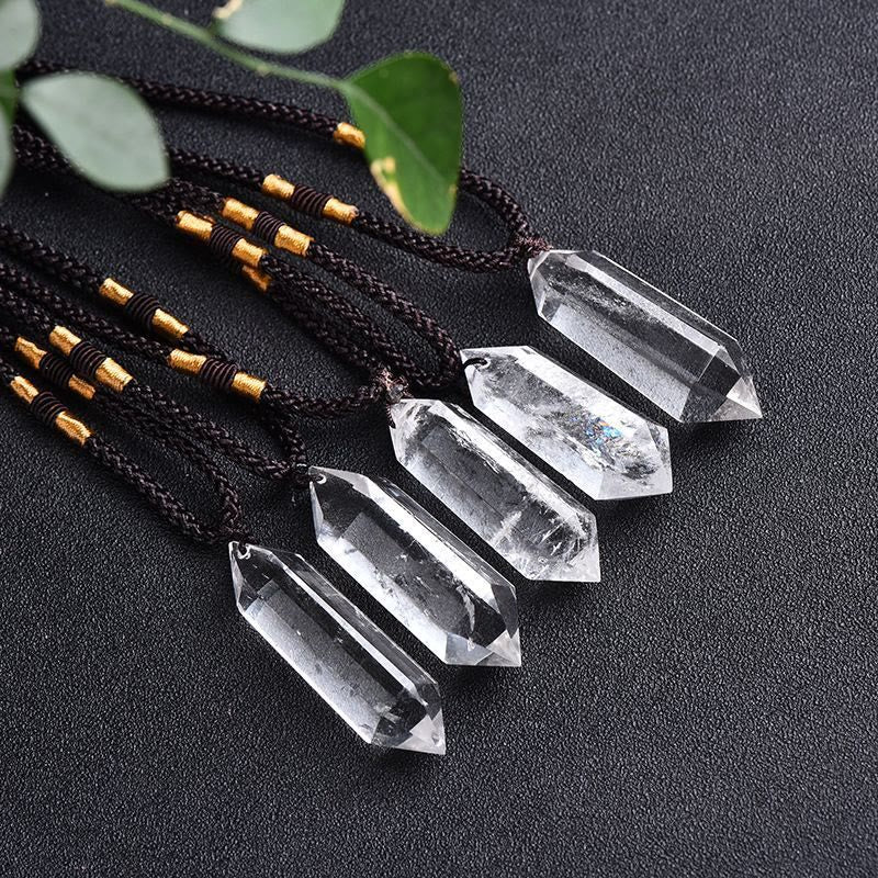Gift-ready spiritual crystal necklace displayed in soft lighting