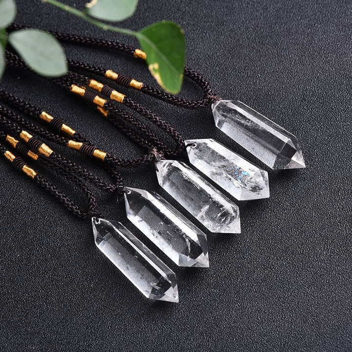 Gift-ready spiritual crystal necklace displayed in soft lighting