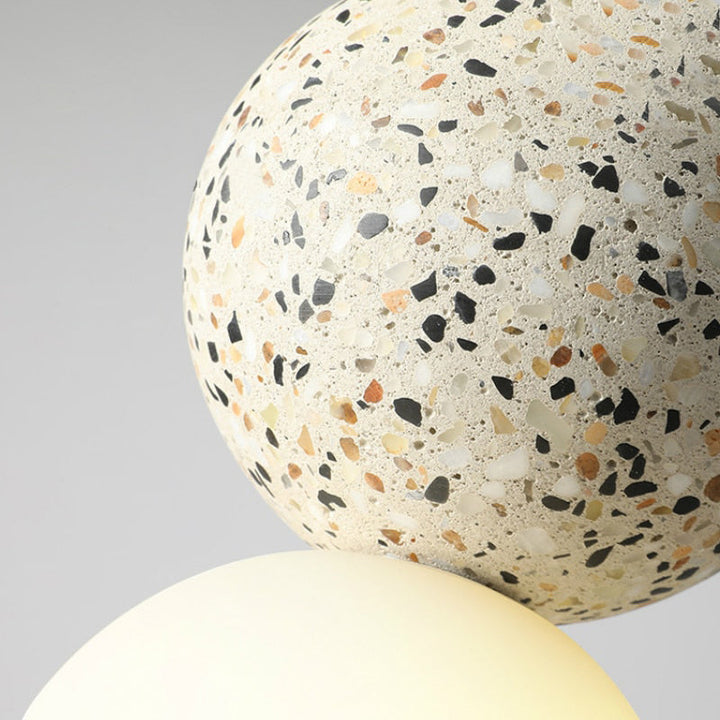 Stylish hanging lamp casting warm ambient interior lighting over a kitchen island