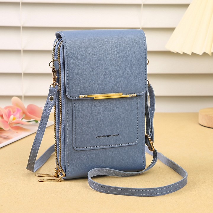 Phone crossbody bag back view featuring extra slip pocket for quick item access