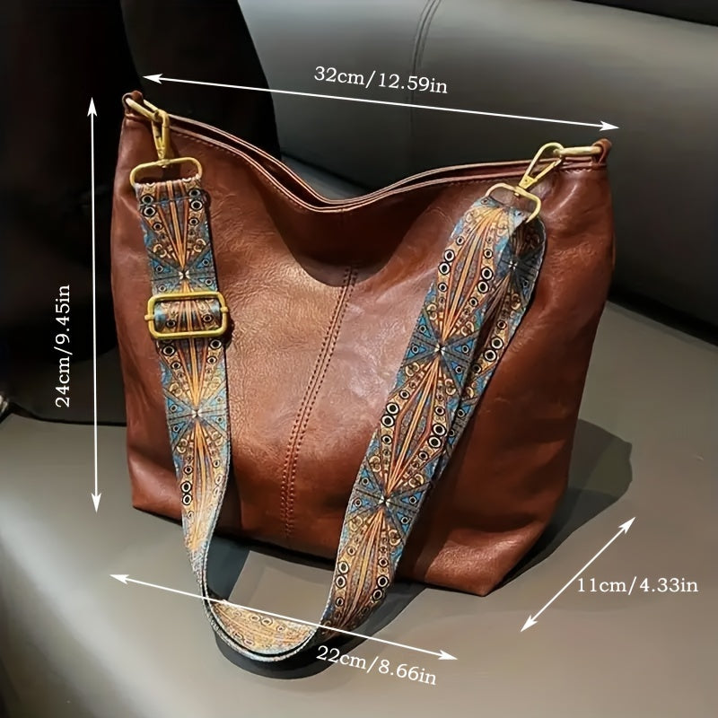 Strap adjustment buckle detail on the versatile crossbody handbag