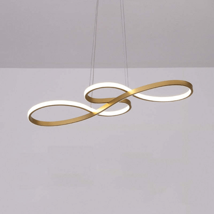 Gold musical note LED pendant lamp hanging against a neutral background