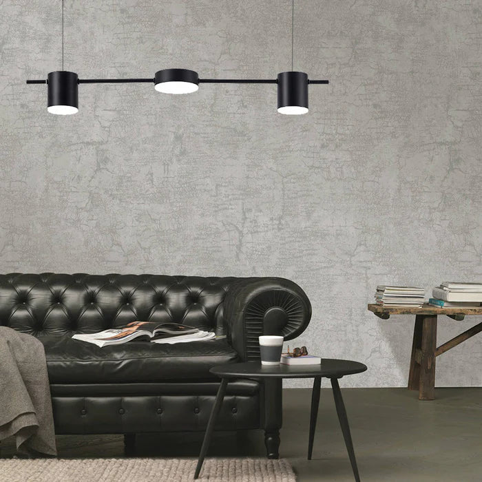 Detailed shot of the durable metal canopy and suspension cord of the pendant light