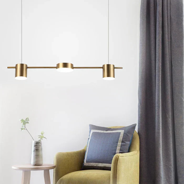 Modern aluminium chandelier suspended in a spacious industrial style living room