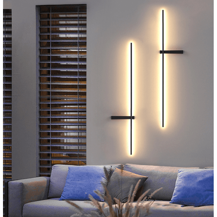 Contemporary slim LED wall light fixtures installed in a modern living space