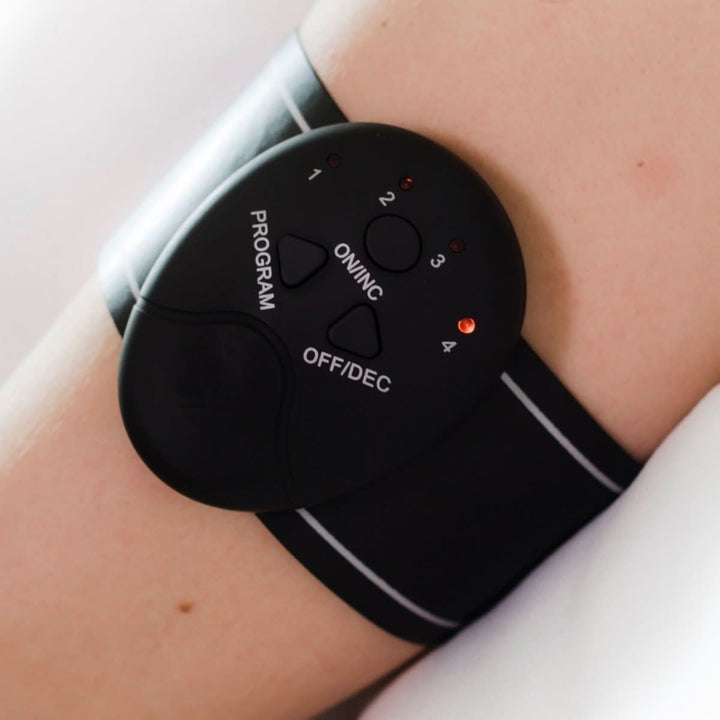 Complete workout gear set including EMS muscle stimulator and controller units