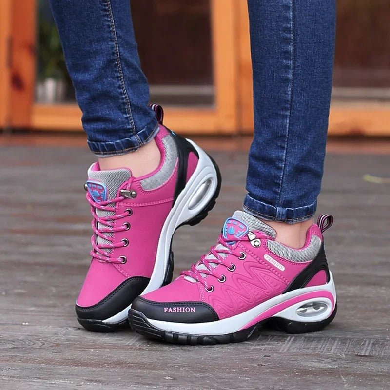 Black posture correction walking shoe with supportive orthopedic design