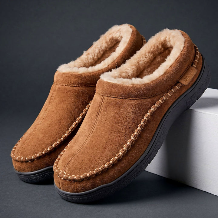 Brown men's lodge slippers with plush lining on display