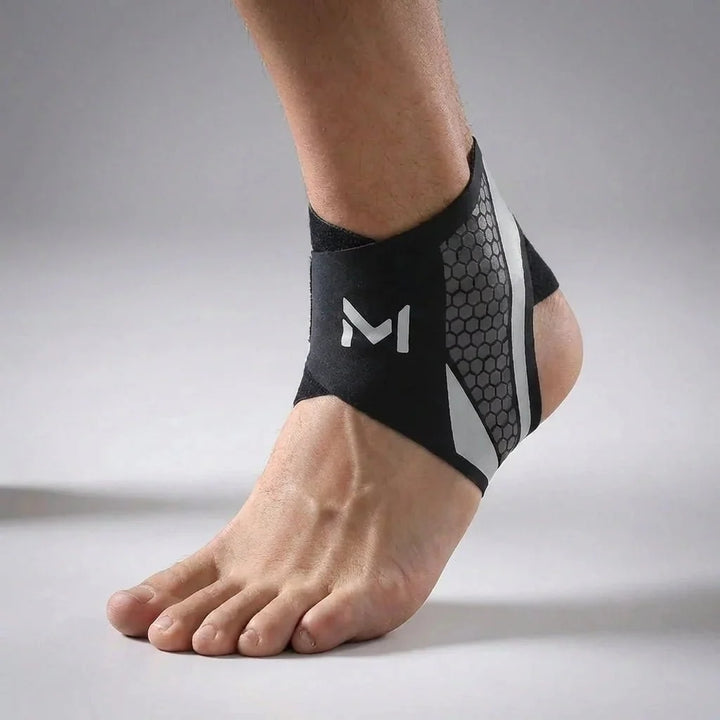 Detailed shot of the Black Gray ankle support wrap highlighting the secure cross-strap design.