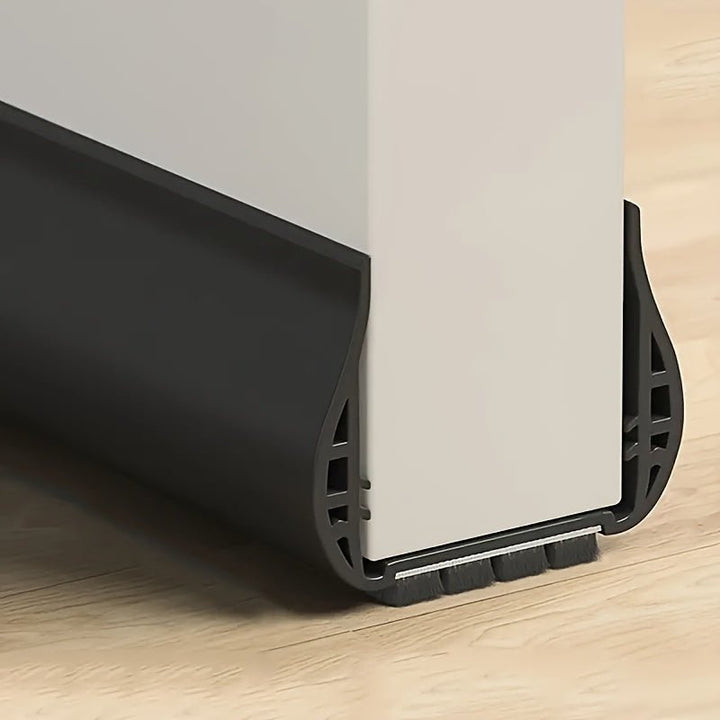 Noise reduction soundproofing strip attached to bottom of room door