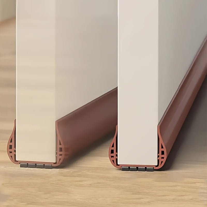 Energy efficient door draft blocker installed on interior wooden door