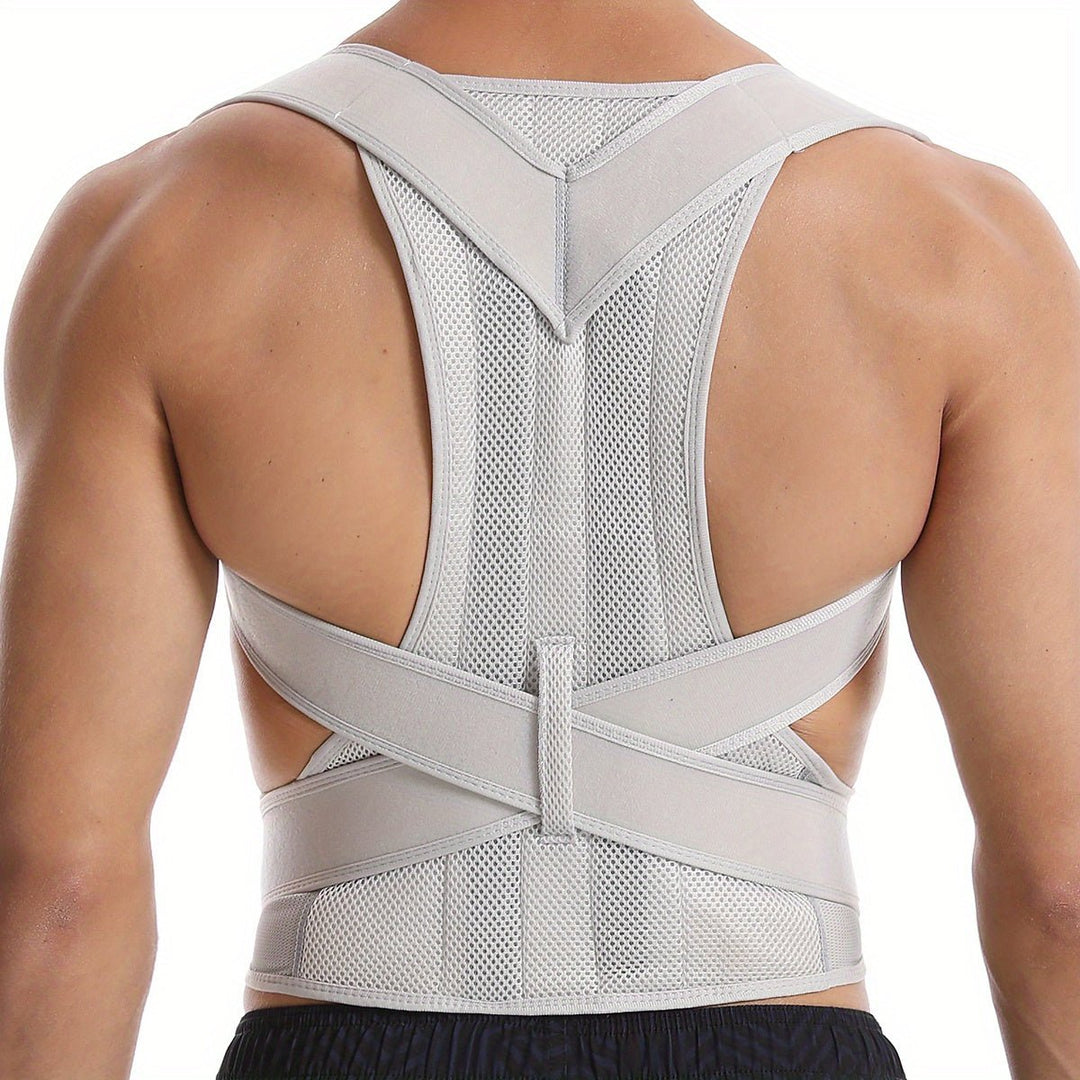 Rear view of a person wearing the adjustable posture corrector with breathable mesh panels